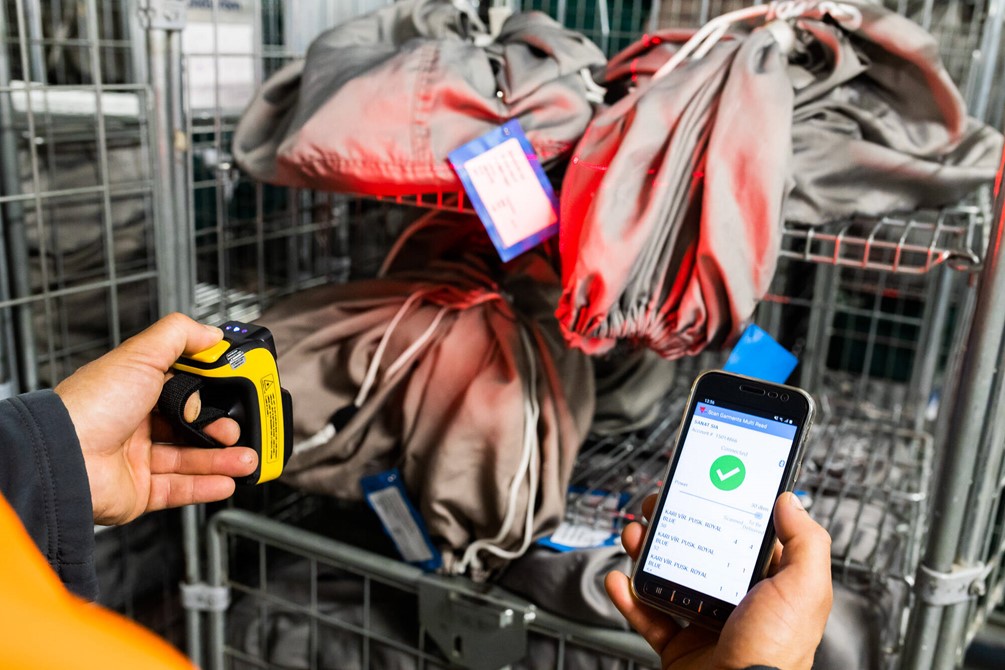 Lindstrom scanning textiles using TSL Mobile UHF RFID Reader